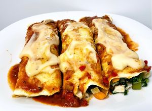 Una foto de Canelones de pollo y verdura