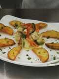 Blanquete de pollo con papas rústicas