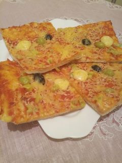 صورة لوصفة بيتزا بيتية سهلة وسريعة