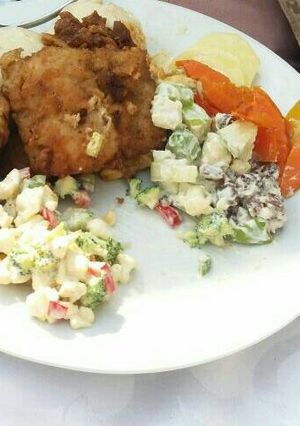 A picture of Cauliflower and broccoli salad.