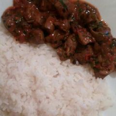 A picture of Wet-Fried liver with Boiled rice.