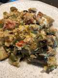 Falso arroz de coliflor con rape, gambas y alcachofas