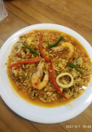 Una foto de Paella
