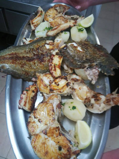 Una foto de Parrillada de pescado