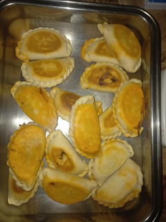 Una foto de Empanadas de Bondiolita de Cerdo Braseada