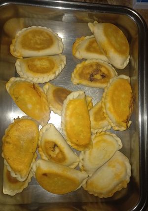 Una foto de Empanadas de Bondiolita de Cerdo Braseada