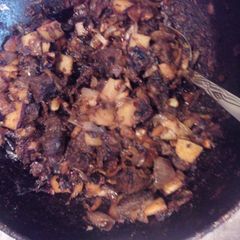 A picture of Garlic Smoked  Beef Fry.
