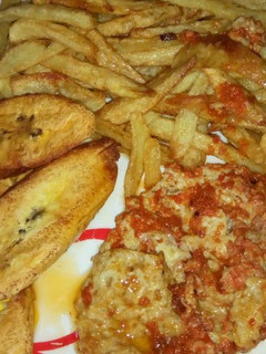 A picture of #chips,plantain,and peppered fried egg......