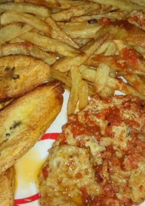 A picture of #chips,plantain,and peppered fried egg......
