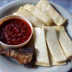 A picture of Yam Fingers,Sweet Chilli Pepper Sauce and Fried Fish.