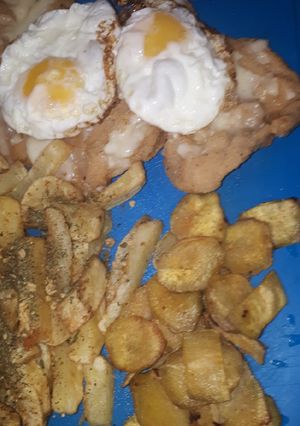 Una foto de Milanesas napolitanas xxl