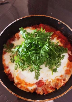 รูปของ Shakshuka ไข่ในซอสมะเขือเทศ🍳🍅🍴