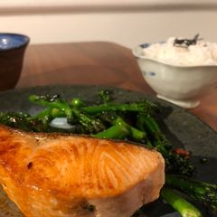 A picture of Pan fried salmon with vegetable.