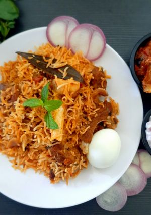 A picture of Mutton biryani in electric rice cooker.