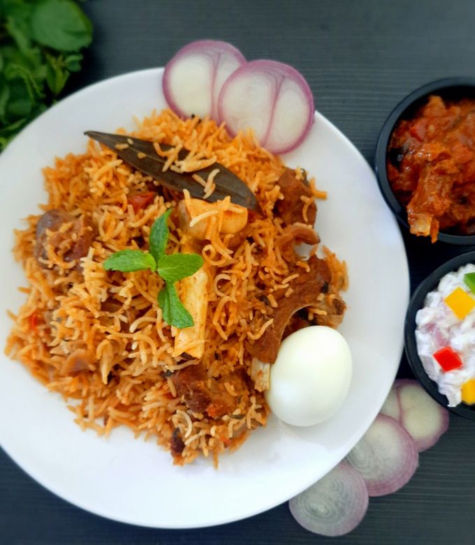 A picture of Mutton biryani in electric rice cooker.