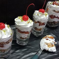 A picture of Gulab jamun &granola parfait.