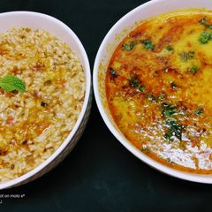 A picture of Moong Dal khichdi with Punjabi Dal Tadka/ Punjabi Risotto.