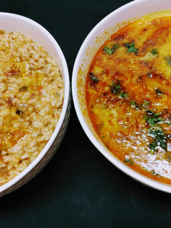 A picture of Moong Dal khichdi with Punjabi Dal Tadka/ Punjabi Risotto.