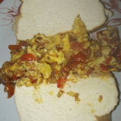 A picture of Fresh bread with egg sauce.