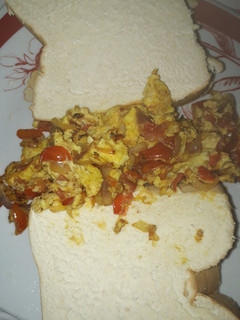 A picture of Fresh bread with egg sauce.