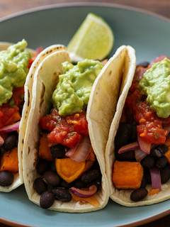 A picture of Sweet Potato, Black Bean, and Salsa Roja Tacos.