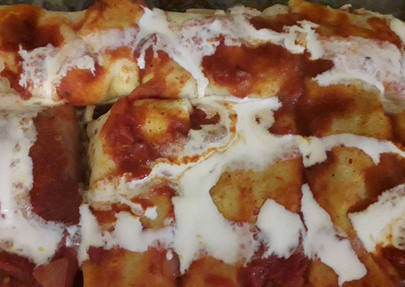 Paquetitos de jamón y muzzarella