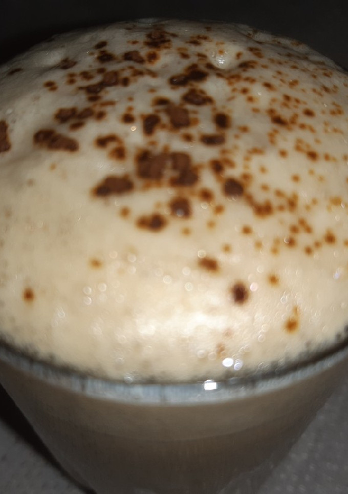 A picture of Instant coffee with lots of foam.