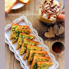 A picture of Chilli Cheese Toast with Cold Coffee.