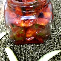 A picture of Raw mango pickle.