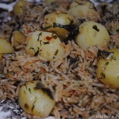 A picture of Herbed rice with potatoes.