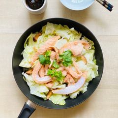 A picture of Steamed cabbage with salmon served with homemade ponzu sauce.