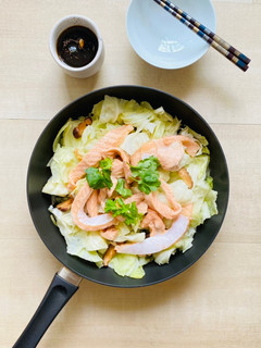 A picture of Steamed cabbage with salmon served with homemade ponzu sauce.