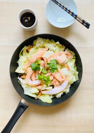 A picture of Steamed cabbage with salmon served with homemade ponzu sauce.