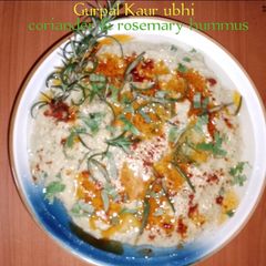 A picture of Coriander & rosemary hummus🌿🌱🥀🧄🌻.