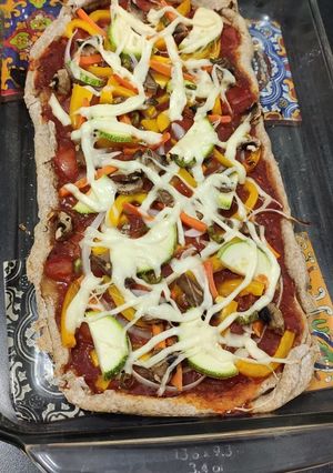 Une photo de Pizza multicolore