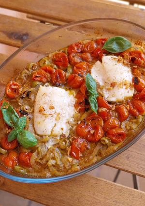 A picture of Baked Cod with Cherry Tomatoes, Onion, Olives, and Anchovies.