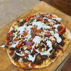 A picture of Spiced Beef Flatbread Pizza with Za’atar Lemon Yoghurt 😋.