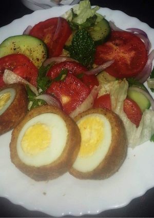 A picture of Scotch Eggs and Salad.