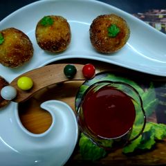 A picture of Rava Upma Arancini.