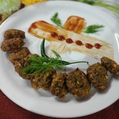 A picture of Palak moong dal fritters.