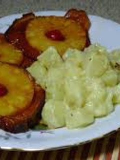 Una foto de Chuletas ahumada con piña