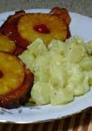 Una foto de Chuletas ahumada con piña
