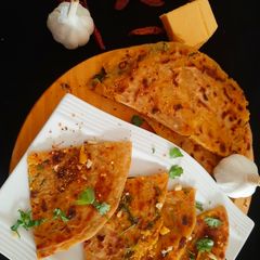 A picture of Masala Garlic cheese paratha.