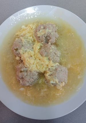 A picture of Meatballs in Broth with Egg.