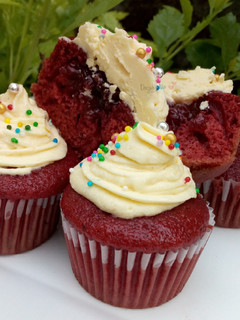 A picture of Jam filled Red Velvet cupcakes.