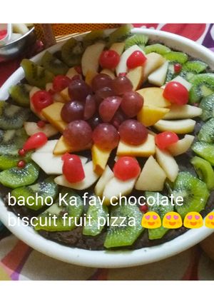 A picture of Chocolate biscuits fruit pizza totally unique.