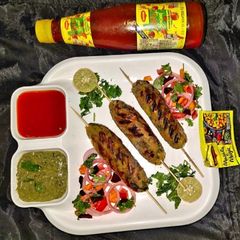 A picture of Shakarkand Seekh Kabab.