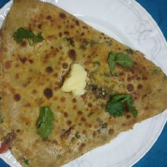 A picture of Egg cheese stuffed paratha.