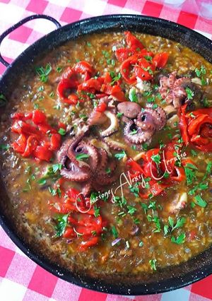 Foto principal de Arroz bomba caldoso de pulpitos y tiras de piquillo