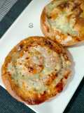 Ensaimada rellena de sobrasada gratinada con queso roquefort a la miel